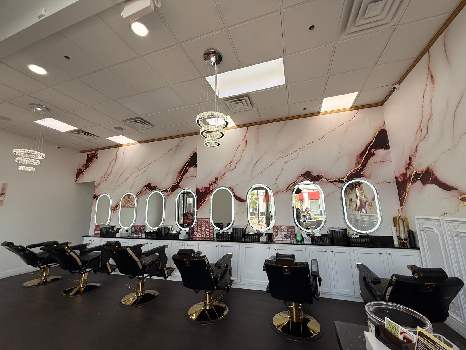 Styling chairs with gold bases at Eyebrow Threading & Beauty salon