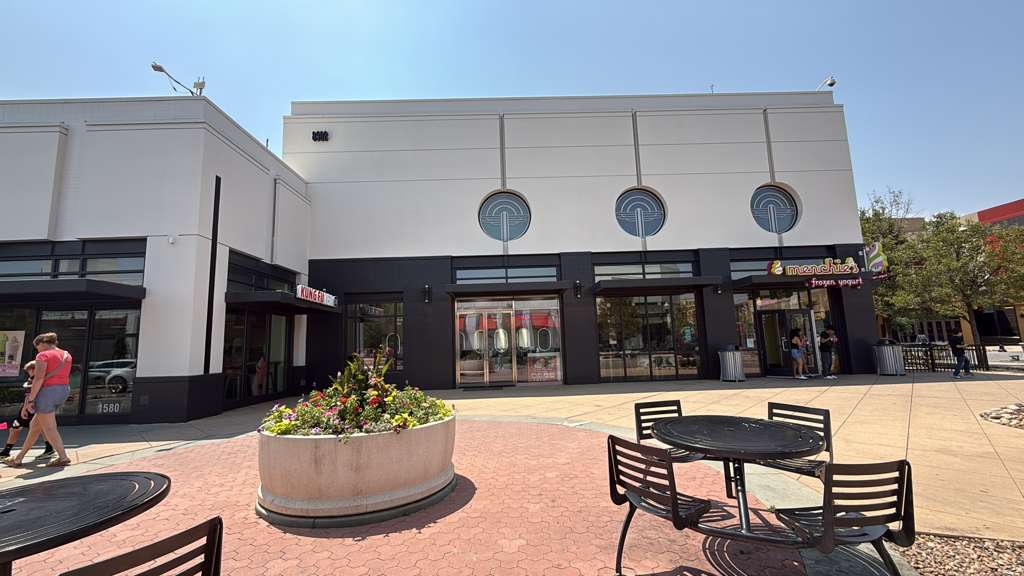 Waiting area and service stations inside Eyebrow Threading & Beauty, Northfield Denver
